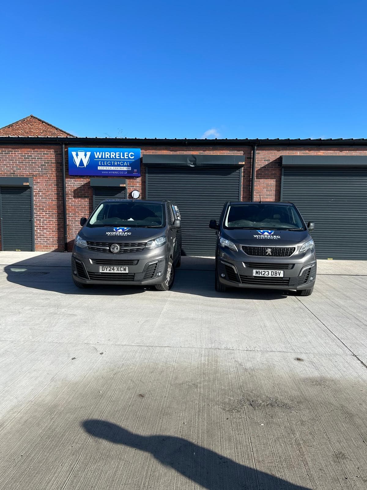 Wirrelec vans outside the company unit on the Wirral